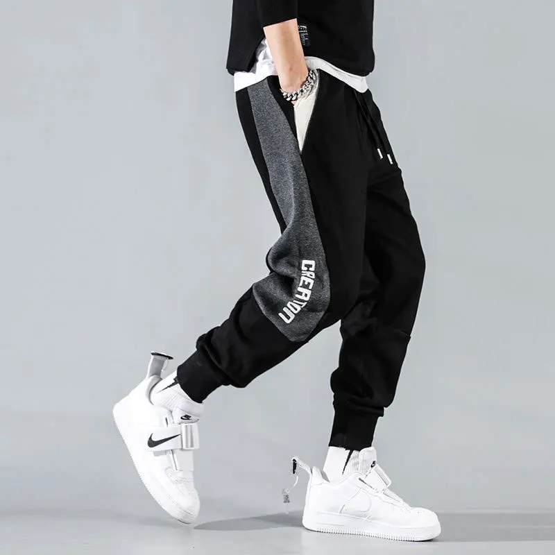 Reviews Fashion Streetwear Men Jeans Loose Fit Spliced Designer Casual Sweatpants Men Knitted Hip Hop Pants Men Joggers Pants Hombre