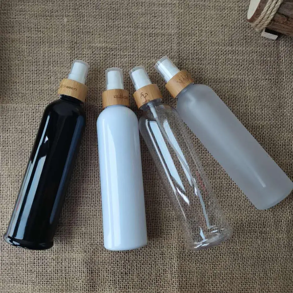 

4 OZ Custom Logo PET Costom Rounds Plastic Bottles with Bamboo Dispensing Cap Lotion Plastic Bottle With Pump