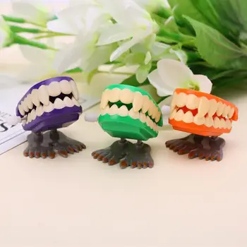

Clockwork Jumping Denture Educational Mechanical Toys Halloween Prank Decoration