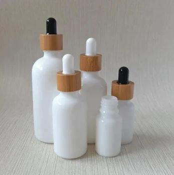 

Beard oil/perfume Bamboo cap Glass Dropper Bottles White Porcelain Essential Oil Bottle Customize 30ml 50ml 100ml E Juice Bottle