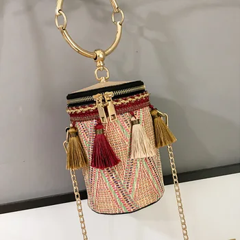 

Chain ethnic wind ring shoulder bag straw woven cylinder small bag small fairy tassel bucket bag clutch bag