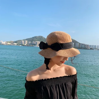 

Hat female summer sunscreen sun hat bow fisherman hat Japanese breathable knitted straw hat beach hat