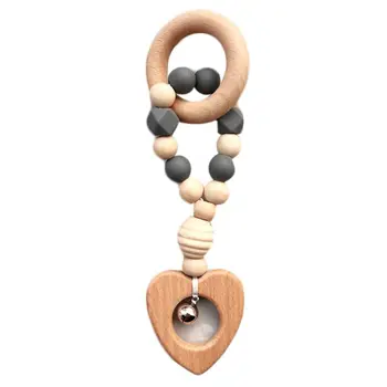 

Silicone Wooden Baby Teether With Bells Safe Maternal and Child Supplies Newborn Teeth Biting Bead Toys