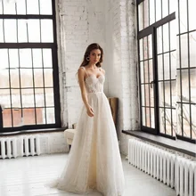 

2022 Simple Spaghetti Straps Tulle Wedding Dress Elegant Sweetheart Neck A-Line Lace Appliques Lace Up Backless Bridal Gown