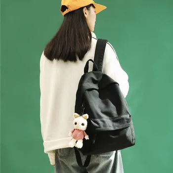 

2020 new Japanese trendy schoolbag female student Korean version of solid color simple student backpack large capacity Softback