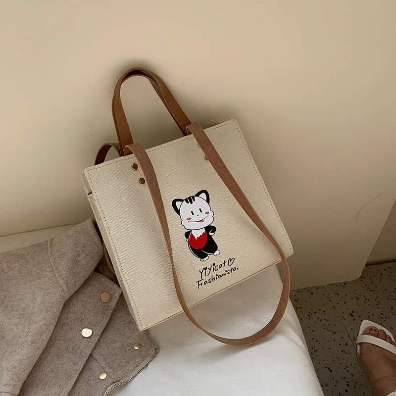 

2019 popular new tide and south korea version of a century of oblique canvas bag single shoulder simple fashion handbag .