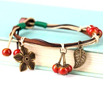 

Beautiful Hand-woven Women's Bracelets Vintage Ethnic Style Ceramic Beaded Alloy Flower Leaves Pendant Jewelry Accessories
