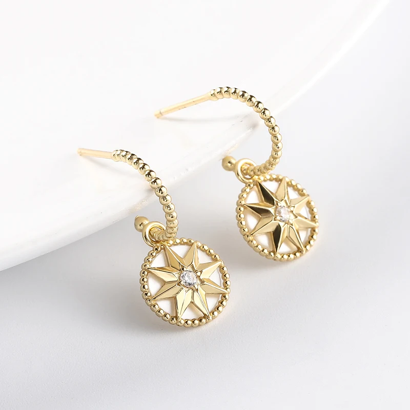 

Fashionable S925 lucky compass eight awn star stereo zirconia French advanced sense classic temperament stud earrings