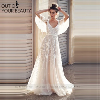 

2020 New Elegant Evening Dress White Lace Deep V-neck Hollow Crochet Flowers Long Sleeve Neckline Lace Design Fashion Dress