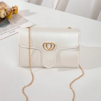 

2020 Fashion Trend Women Solid Color Chain Shoulder Bag Heart Shape Decoration PU Leather Simple Casual Crossbody Handbags Tote