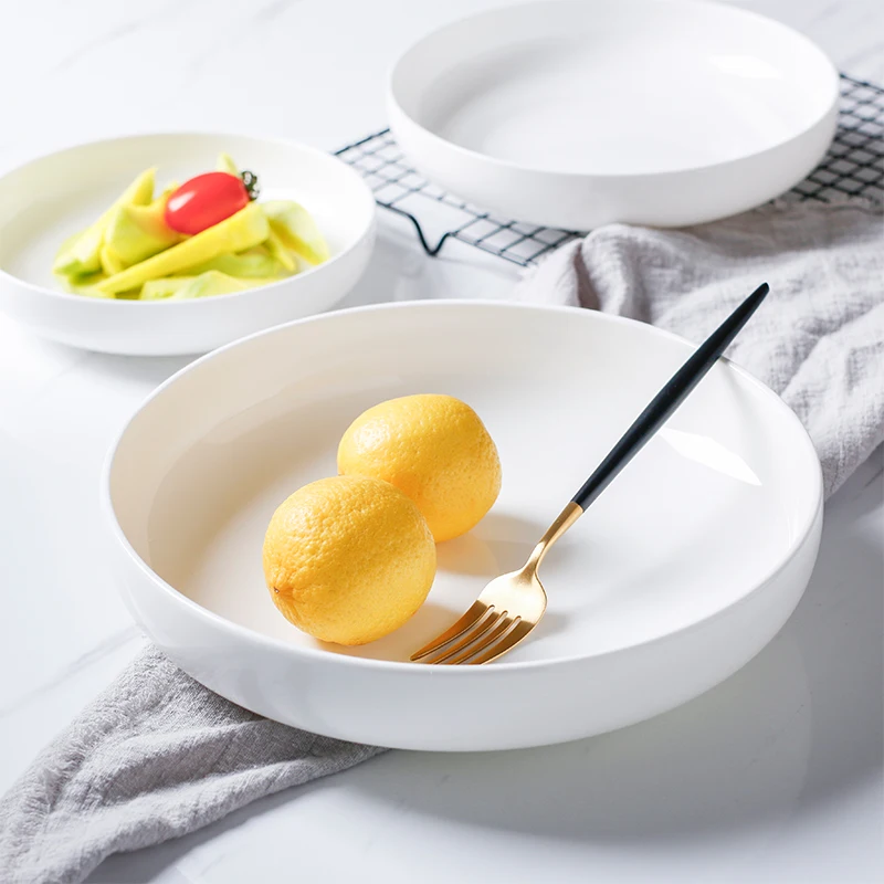 Japanese style white simple ceramic disc creative round ceramic soup plate deep dish salad plate home baked rice steamed eggs