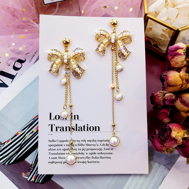 2019-New-Arrival-Pearl-Trendy-Water-Drop-Women-Dangle-Earring-Butterfly-knotted-Pearl-Earrings-Korean-Tassel