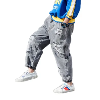 

2020 children's clothing new spring and autumn clothing boys ripped jeans in the big boy tide treasure wild jeans trousers