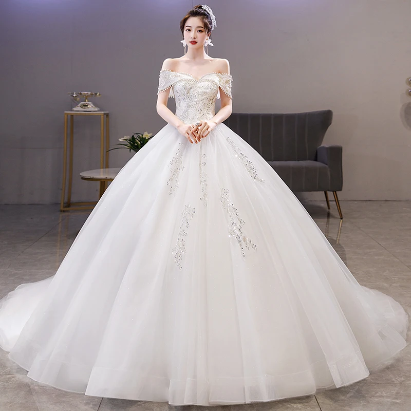 

2023 Luxury Bead Off The Shoulder Wedding Dresses Embroidered Tulle Sweep Train Wedding Gowns Vestidos De Novia