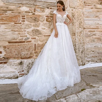 

Verngo A line Wedding Dress Boho Lace Tulle Wedding Gowns 2020 Elegant Backless Bride Dress Short Sleeves Ivory/White Dress