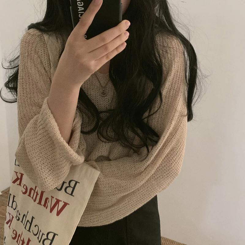 

Thin section sweater sweater female 2019 new loose V-neck mesh micro transparent solid color sun protection clothing cover tide