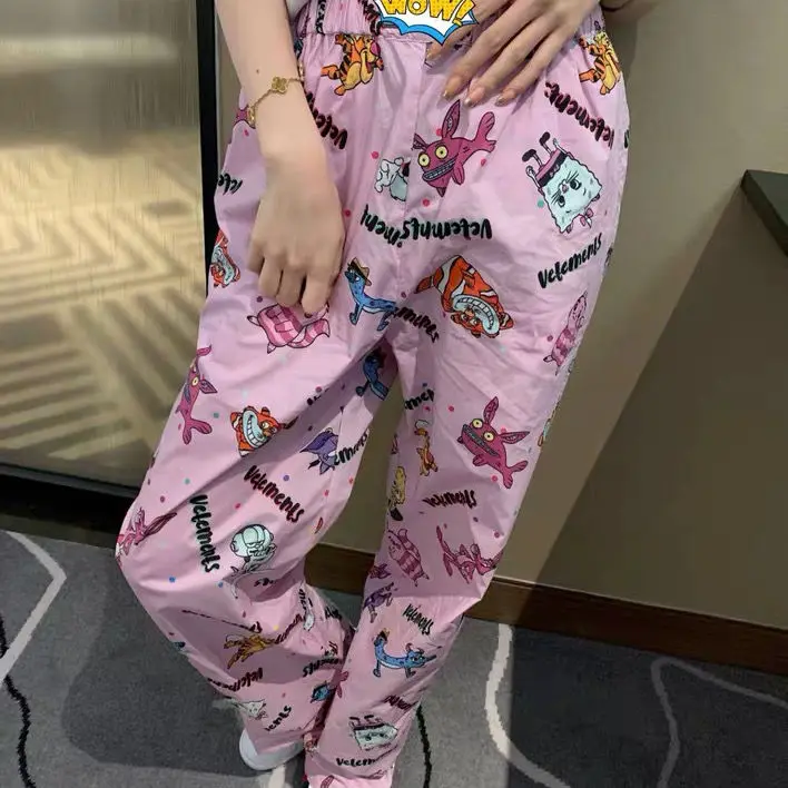 Net celebrity same style tide brand thin imported fabric cartoon printing VTM casual pants pink loose pants women