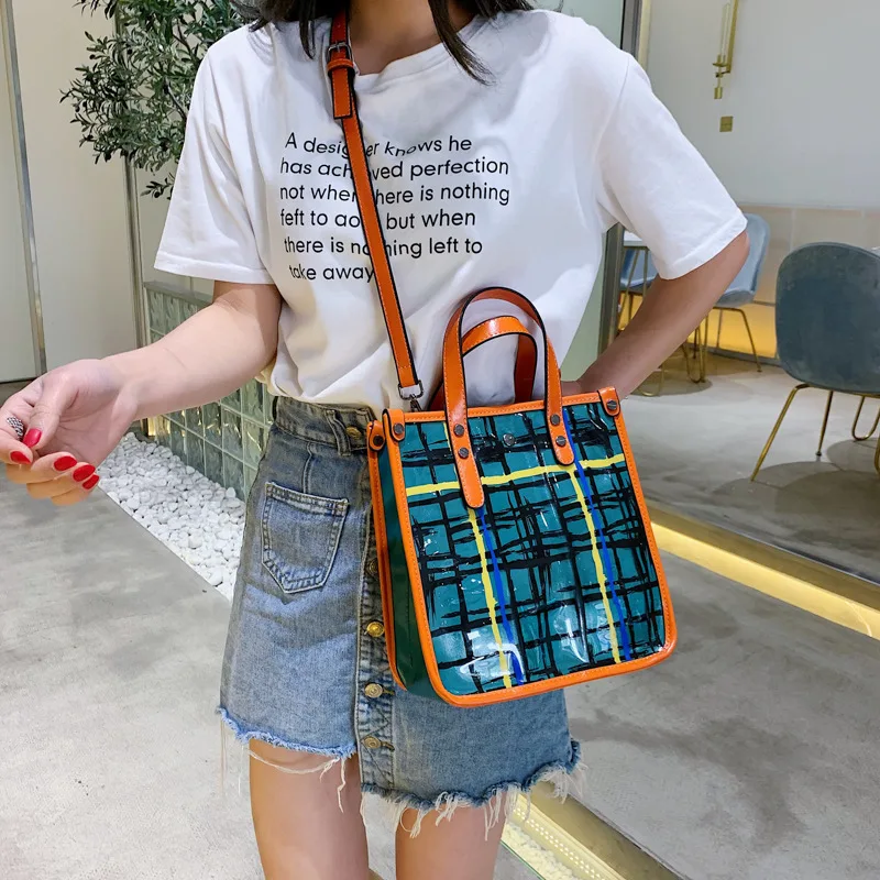 

Women's Bag New Type 2019 Nethong Same Wide Shoulder Belt Lattice Korean Transparent Jelly Colour Raincoat Bag Personality