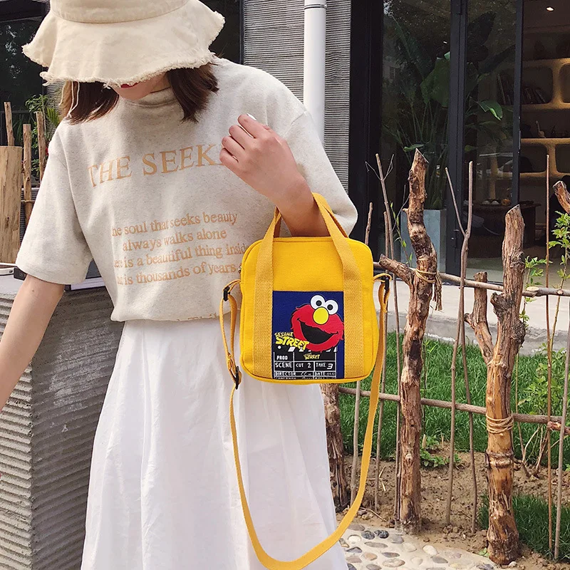 

INS Korean-style Japanese-style Soft Girl Sesame Street Cartoon Canvas Bag Handbag Students Literature And Art Crossbody Bag WOM