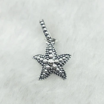 

The beaded starfish pendant is inspired by beautiful creatures in the deep sea. The back is smooth metal with line patterns