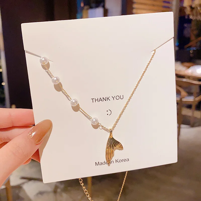 

Fashionable Pearl Necklace Female Temperament Fishtail Pendant Titanium Steel Clavicle Chain Personalized Fine Jewelry