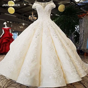 شراءLS34332 2020 فستان زفاف فاخر برقبة على شكل حرف O ورباط على شكل حرف O فساتين زفاف عاجية وشامبانيا مع قطار طويل علي الصين