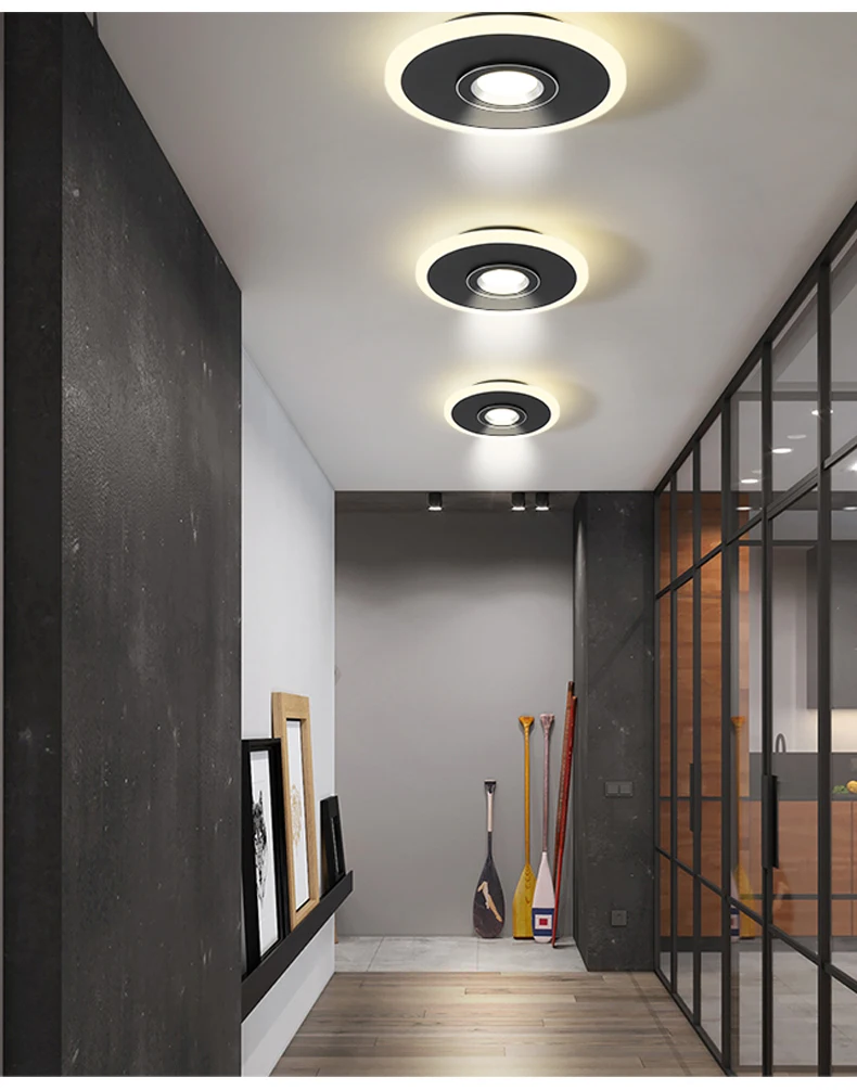 A sophisticated living room with a modern track ceiling light, creating a captivating ambiance.