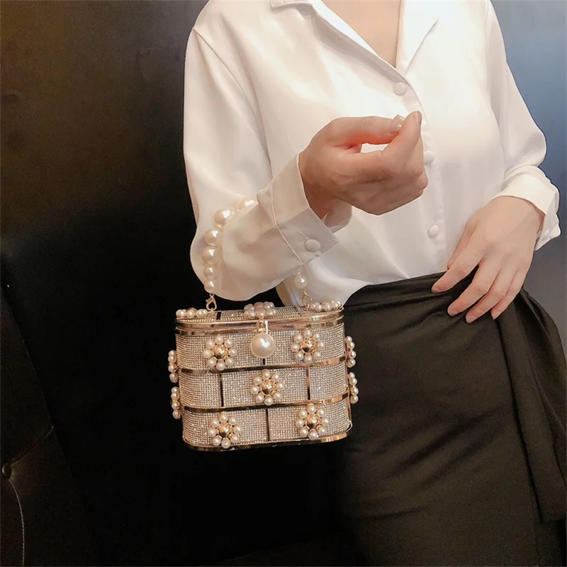 

Rhinestone hand bag female banquet bag temperament ladies fashion dinner bag French niche high-end pearl bird cage bag female