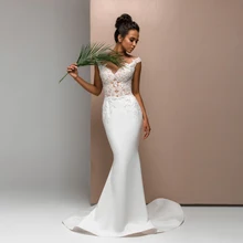 

Sexy Mermaid Wedding Dress Cheap Cap Sleeve V Neck Robe De Mariee For Women Brides Appliques See-through Sweep Train Backless