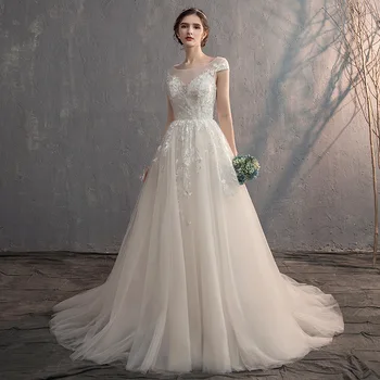 

Modest Wedding Dress 2020 New Style Sexy Sheer Neck Keyhole Back Lace Applique Top Garden Boho Bridal Gowns Short Sleeves