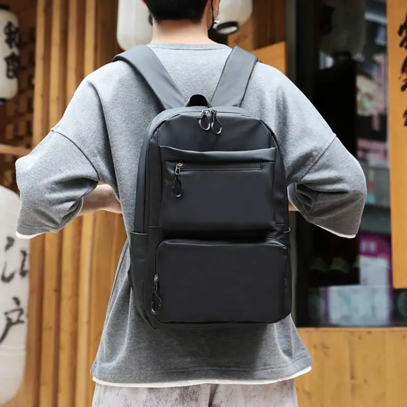 

New men's backpack solid color multi-pocket design high-capacity student bags