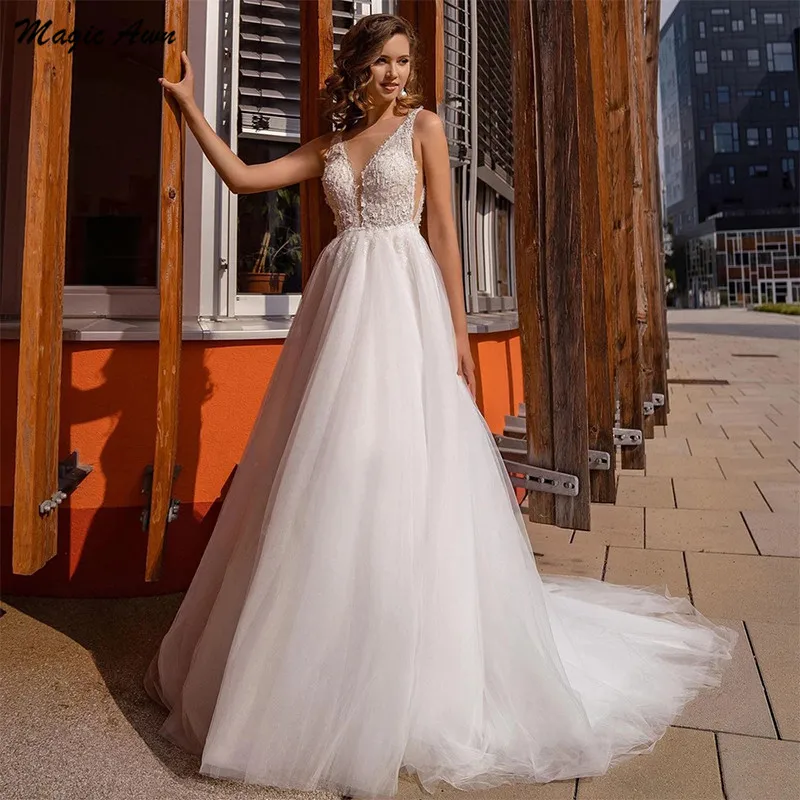 

Magic Awn Elegant Princess Wedding Dresses Lace Appliques Illusion Wedding Party Dress A-Line Boho Backless Vestidos Branco