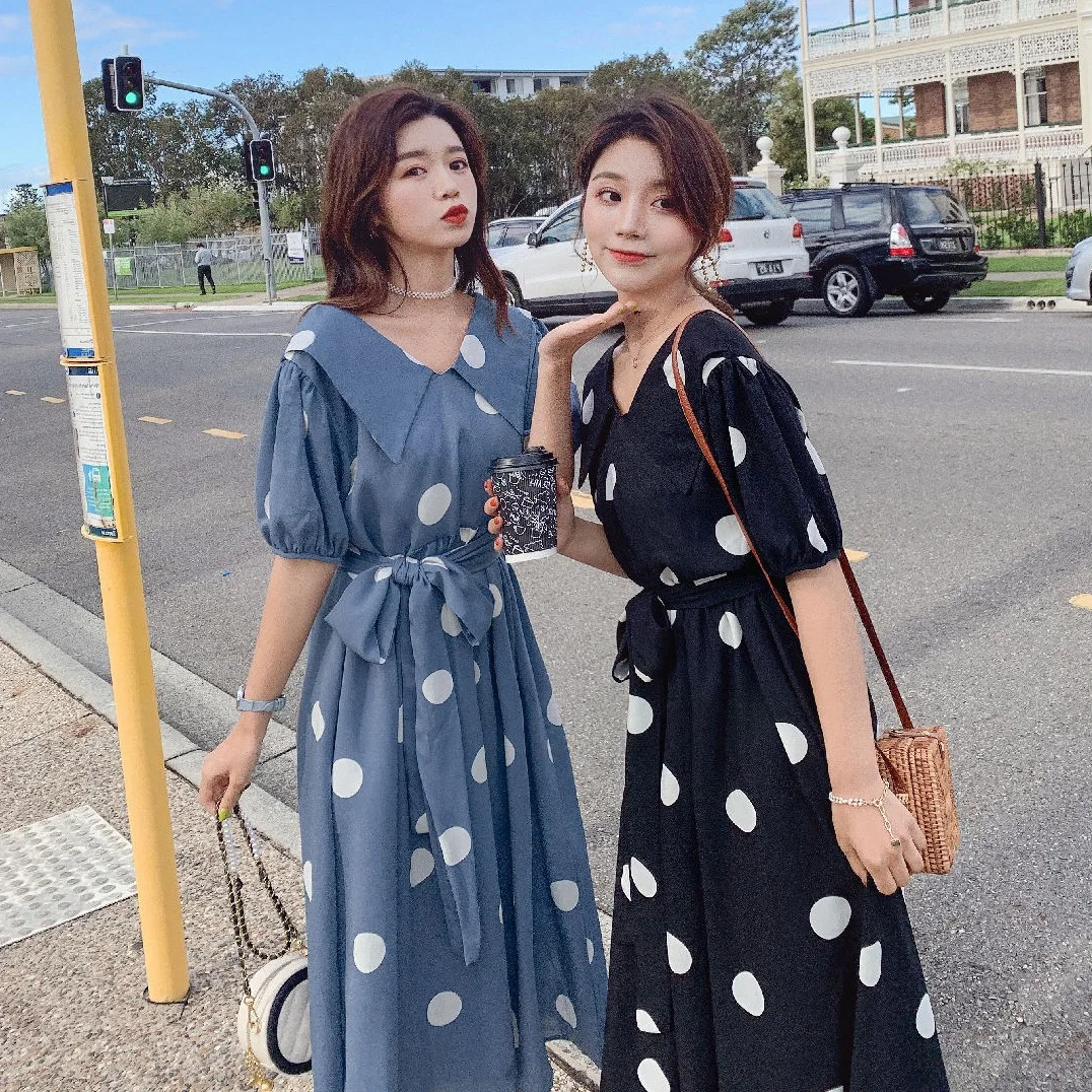 

Photo Shoot CHIC France Elegant Ol Blue Polka Dots Peter Pan Collar Waist Hugging Lace-up Front And Back Two Sides Wears Big Hem