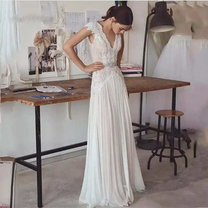 vestido de noiva com as costas abertas