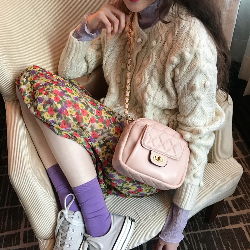 

2019 winter Korean transparent mesh bottoming shirt + cute floral skirt + ball sweater coat