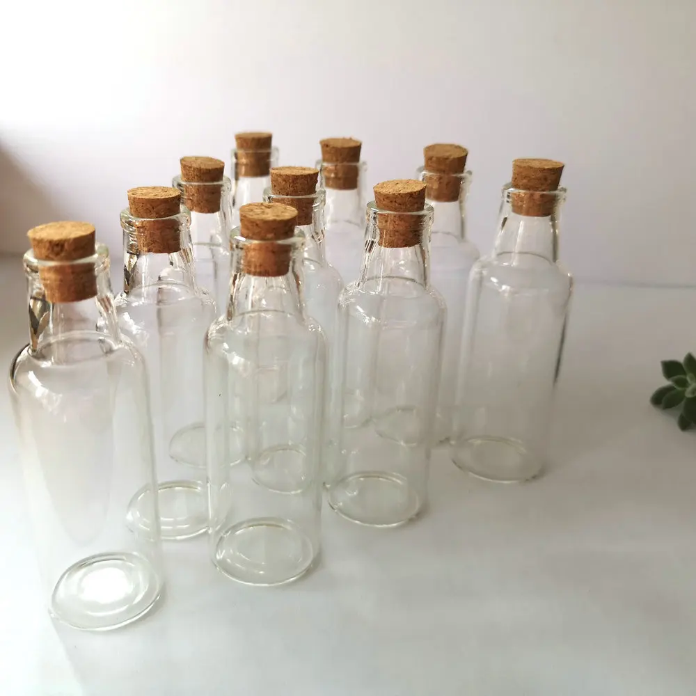 https://ae01.alicdn.com/kf/H690f7799d0fd42f69bba9b4b64844e7ds/10pcs-35ml-30x90x12mm-Empty-Clear-Transparent-Glass-Wishing-Bottles-with-Cork-Stopper-Drift-Jars-Vials-For.jpg