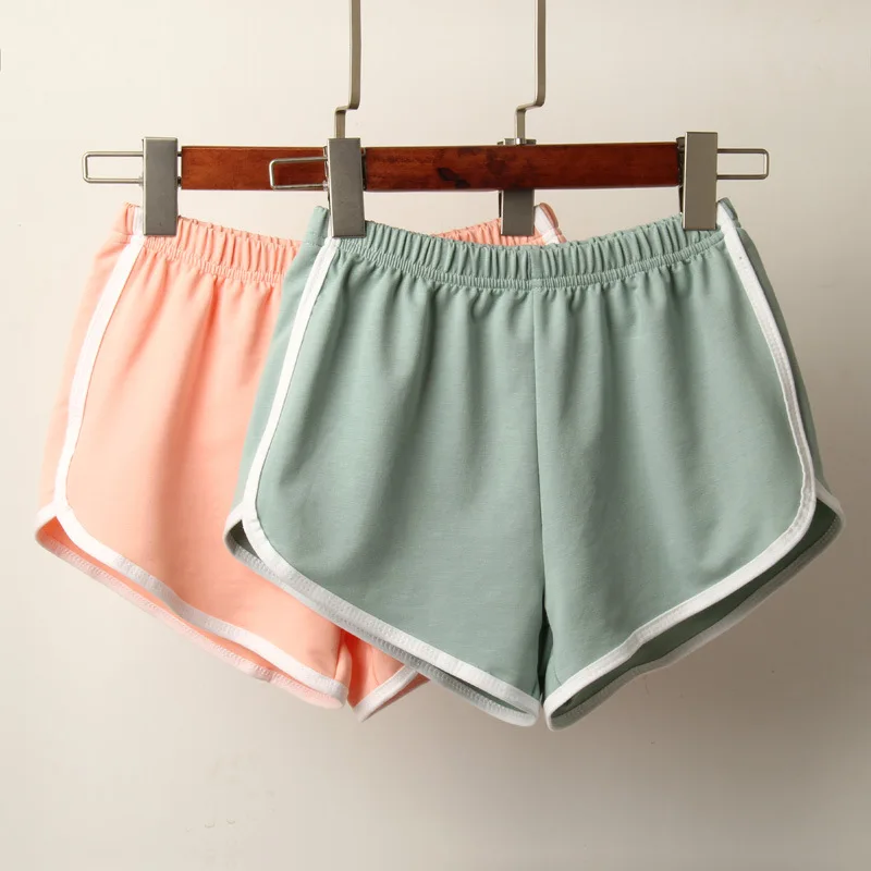 

Sports Shorts Women Summer Casual shorts Elastic Beach Correndo shorts Anti Emptied candy colors
