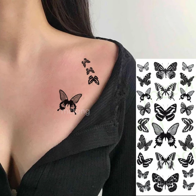 tatuagem de borboleta na mão feminina