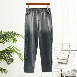 Moda tamanho grande denim feminino calças completas 2021 nova primavera outono cintura alta buraco azul feminino elástico calças de cintura mais tamanho