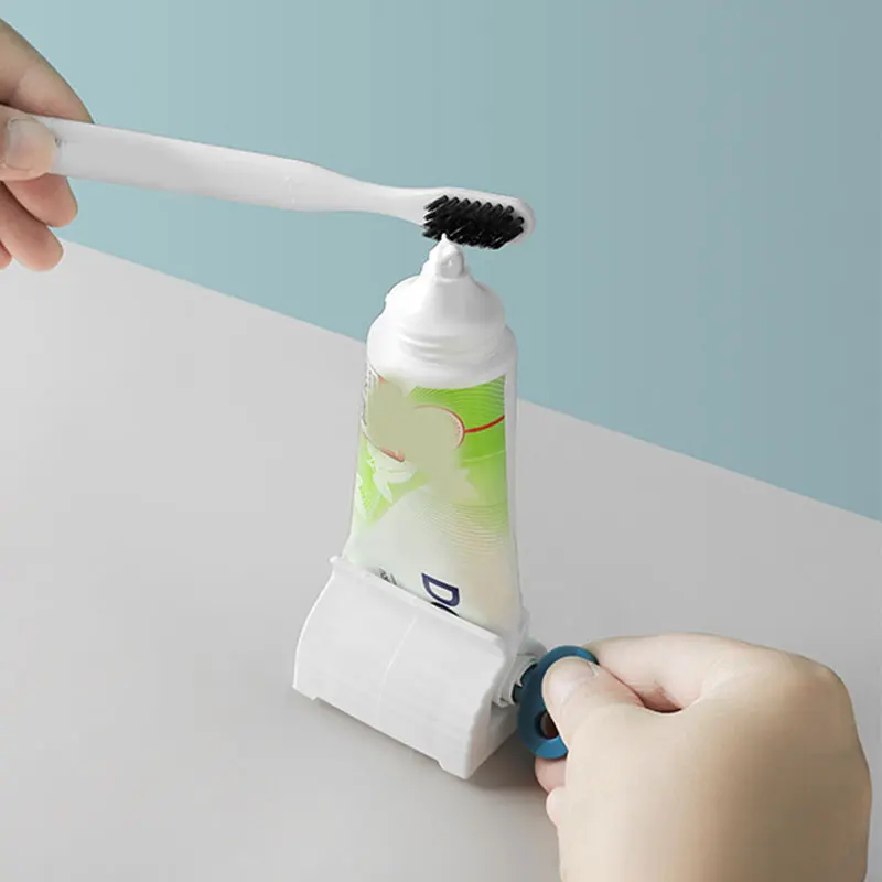 1Pc Rolling Tube Tooth Paste Squeezer Toothpaste Dispenser Bathroom Brush Rack