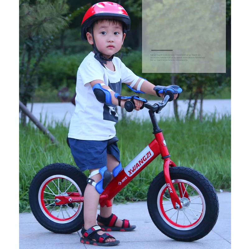 children driving bike