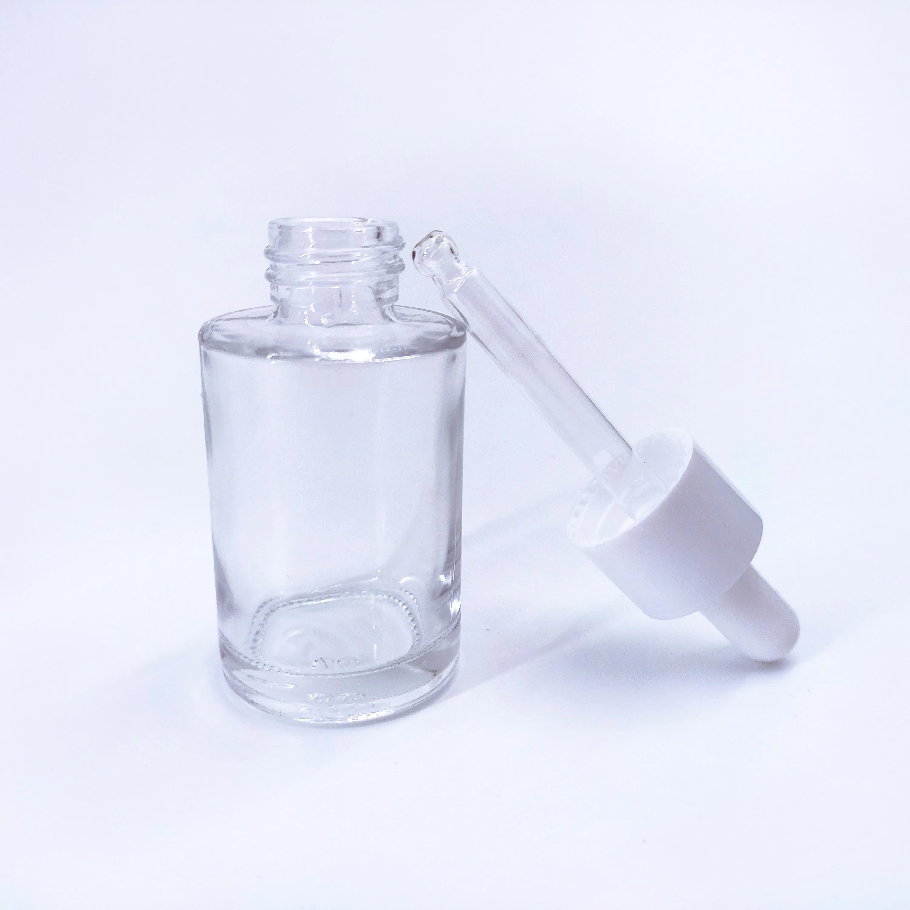 Wholesale Transparent Matte Glass Cosmetic Dropper Bottle Luxury Skin Care Container Essential Oil Beauty Packaging