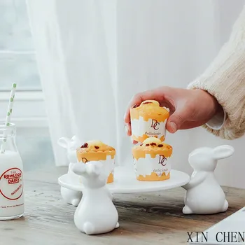 

Cute rabbit cake plate Ceramic white rabbit foot holder creative home decorations ceramic ornaments accessories tea pastry tray
