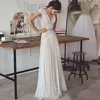 Boho Wedding Dresses 2025 Bohemian Wedding Gowns with Cap Sleeves V Neck Open Back Pleated Skirt Elegant A line Gown Customized 2