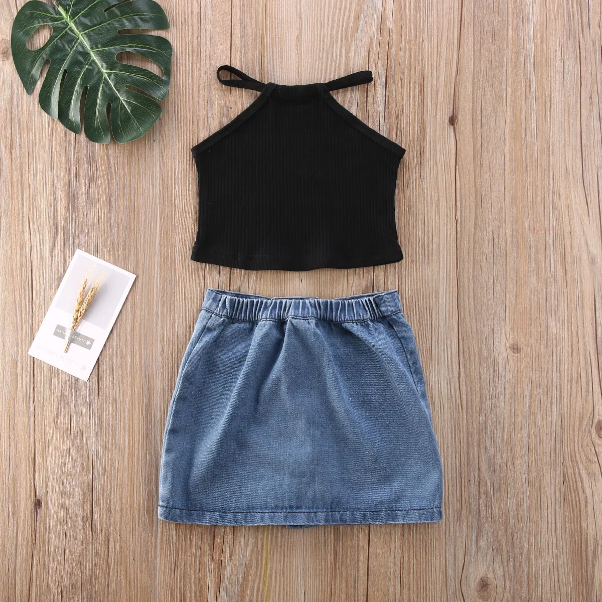 black top with denim skirt