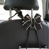 Creative Cute Bowknot Car Seat Back Storage Hooks Vehicle Headrest Organizer Hanger for Groceries Bag Handbag Car Accessories ► Photo 2/6