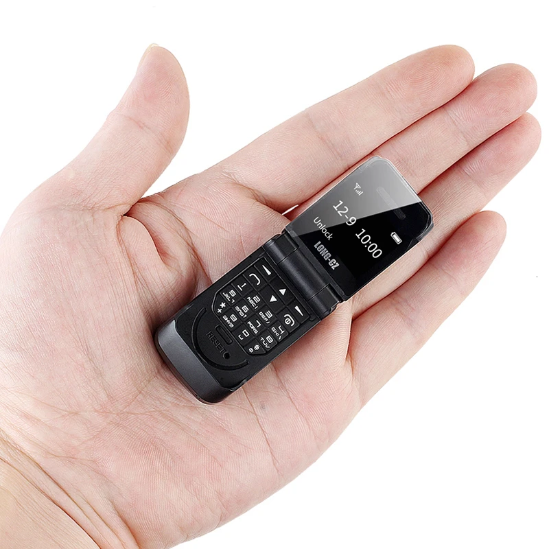 

Mini unlocked flip small clamshell mobile cell phone Bluetooth dialer phones push-button telephones gsm cheap cellphone Magic