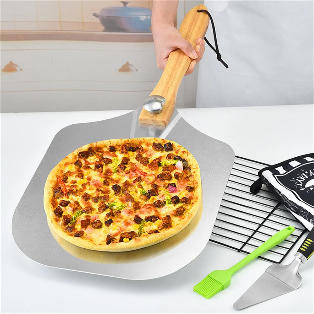 https://ae01.alicdn.com/kf/H69ce2b07a9644850ad5dfe210fefca28K/14-Inch-Pizza-Shovel-Padel-Pizza-Cutter-Knife-Big-Long-Non-Slip-Wooden-Handle-Pizza-Peel.jpg