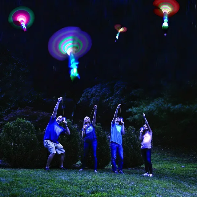 10PCS Outdoor Shining Rocket Flash LED Light Night Kids Luminous Slingshot Toys Shine Slingshot Elastic Helicopter Rotating Toy 3