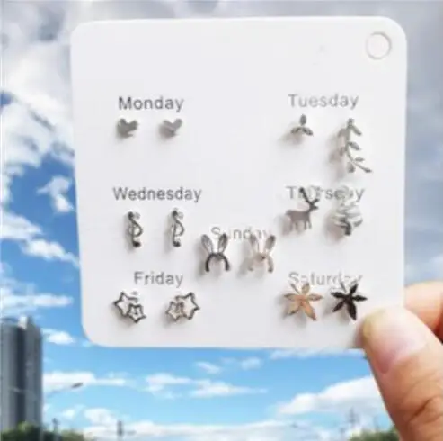 

e 1408 Korean version of the personality of the maple leaf notes peach heart stars a week mood earrings female sweet fashion jew